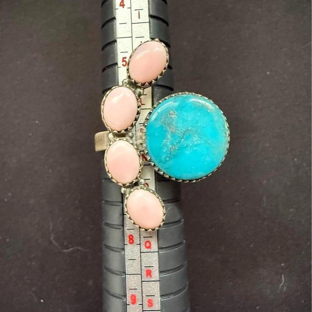 Sterling silver kingman turquoise and pink conch ring. Adjustable